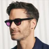 Il modello indossa The LEMTOSH In Black in misura 46 con Purple Nurple Colorato Lenses Moscot LEMTOSH BLACK Custom Made Tints CABERNET