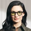 La modella indossa The LEMTOSH In Black in misura 46 con Limelight Colorato Lenses Moscot LEMTOSH BLACK Custom Made Tints CABERNET
